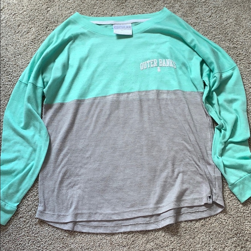 teal and gray long sleeve shirt